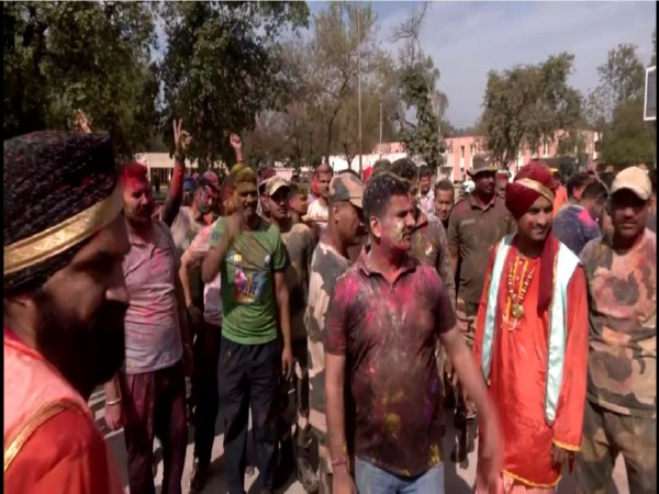 BSF troops celebrate Holi along with their families in Amrtisar (Photo/ANI)