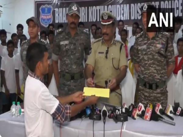 64 Maoists surrender before police in Telangana. (Photo/ANI)