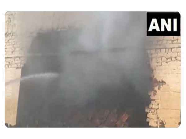 A plume of smoke after fire broke out at a warehouse in Hapur, Uttar Pradesh on Sunday afternoon. (Photo/ANI)