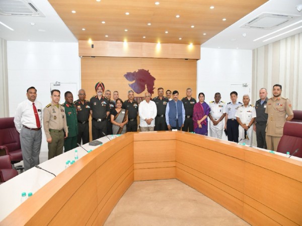  Team of 17 members and Officials from the National Defence College with Gujarat CM Bhupendra Patel  (Pic/@CMOGuj)