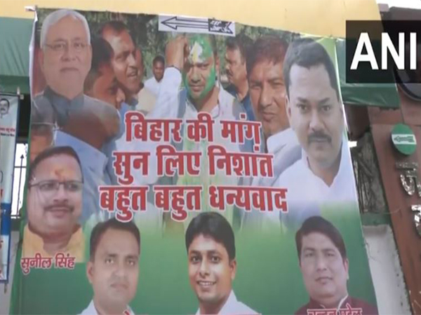 JDU supporters put up a poster outside the party office in Patna in support of CM Nitish Kumar's son Nishant Kumar (Photo/ANI)