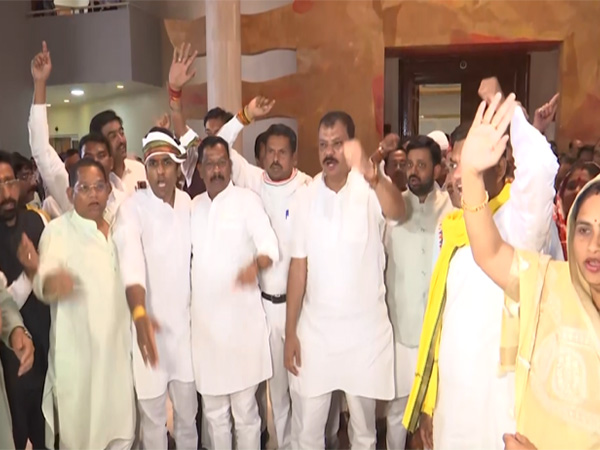 Congress MLAs raising slogans demanding justice after walking out from state assembly (Photo/ANI)