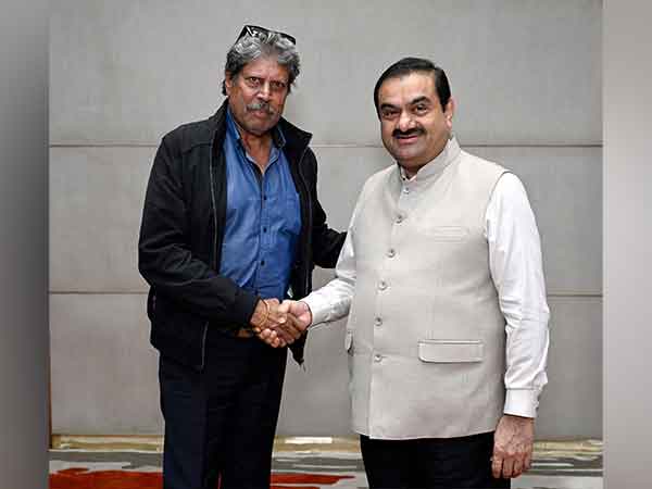 Adani Group Chairman Guatam Adani with PGTI President Kapil Dev (Photo/Adani Group)