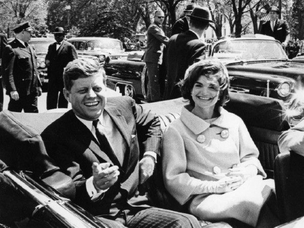 Former US President Kennedy and first lady Jackie sit in a car in front of Blair House in Washington, 1961 (Image/Reuters)