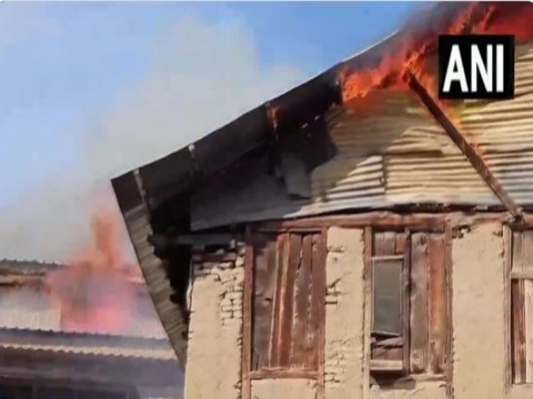 Fire breaks out in several houses in Anantnag on Thursday. (Photo/ANI)