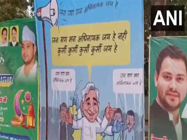 Poster targeting  Bihar CM appears outside Rabri Devi's residence. (Photo/ANI)