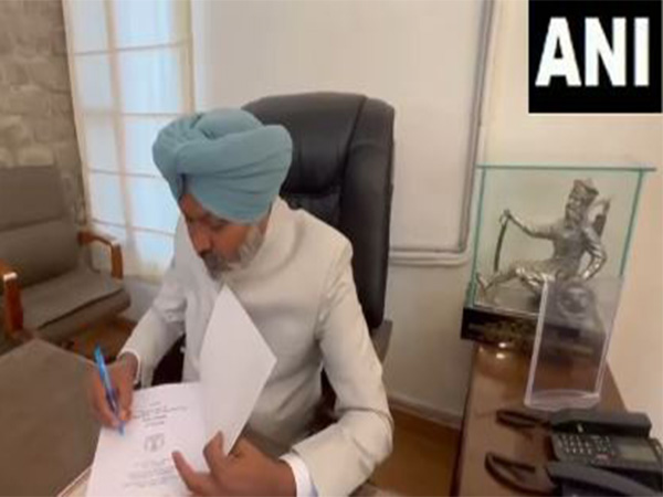 Punjab Finance Minister Harpal Singh Cheema signs the Budget copies, ahead of the presentation of the state Budget 2025-26 (Photo/ANI)