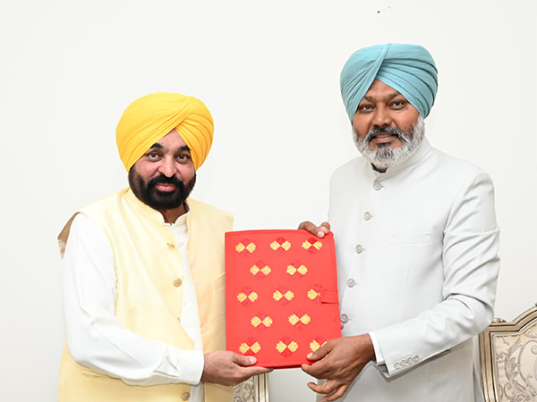 Punjab Finance Minister Harpal Singh Cheema meets CM Bhagwant Singh Mann at his residence budget presentation (Photo/ANI)