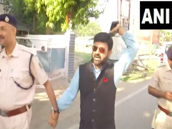 BJP leader Pratul Shahdeo was detained and taken away by the police (Photo/ANI)