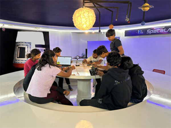 BlueBlocks students assembling their CubeSat payload inside the school’s Space Lab.