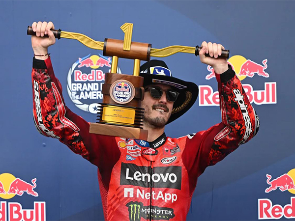 Francesco Bagnaia of Ducati Lenovo Team lifting Grand Prix of The Americas (Image: MotoGP)