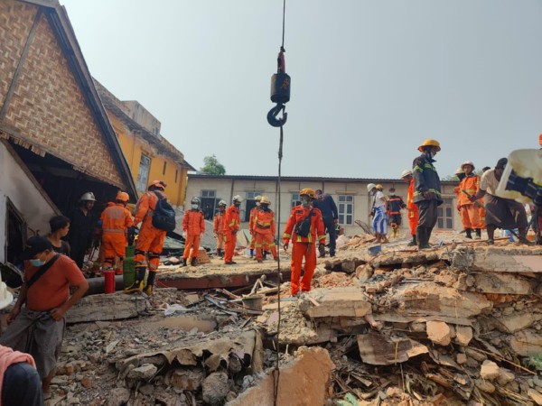 Rescue teams look for survivors in the rubble (Image: X@IndiainMyanmar)