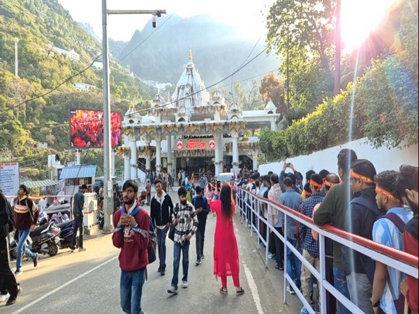 Devotees stand in queue during their visit to Shri Mata Vaishno Devi Shrine. (Photo/ANI)