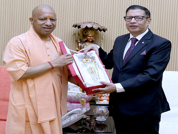 Uttar Pradesh Chief Minister Yogi Adiyanath and Nepal's Ambassador to India, Shankar Sharma (Photo/ANI)