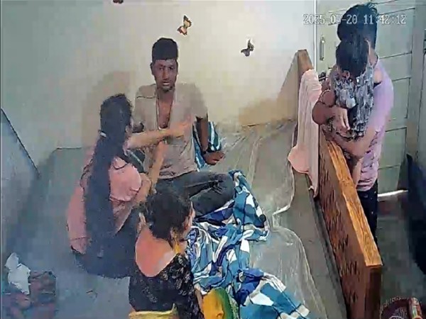 Lokesh being assaulted by his wife (still from viral CCTV footage)