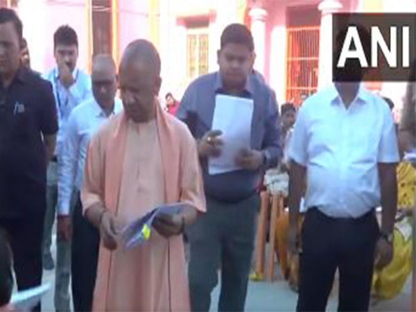 UP CM Yogi Adityanath holds Janata Darshan to listen to grievances of people (Photo/ANI) 