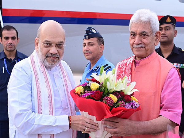 J-K LG Manoj Sinha welcomes Union Home Minister Amit Shah at airport in Jammu. (Photo/ X @OfficeOfLGJandK)