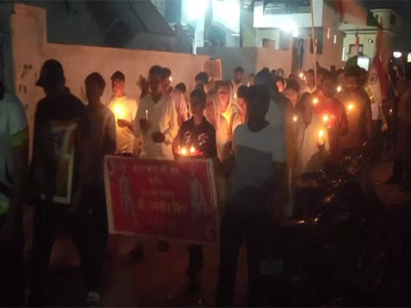 Locals in Mattur cillage in JK's Akhnoor  carrying out candle march remebring martyr Jagbir Singh (Photo/ANI)