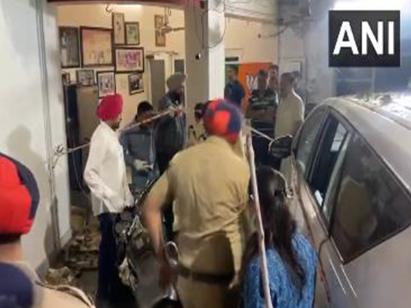 Police team and forensic team examining blast site. (Photo/ANI)