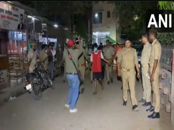 Police with one of the accused in Varanasi gangrape incident. (Photo/ANI)