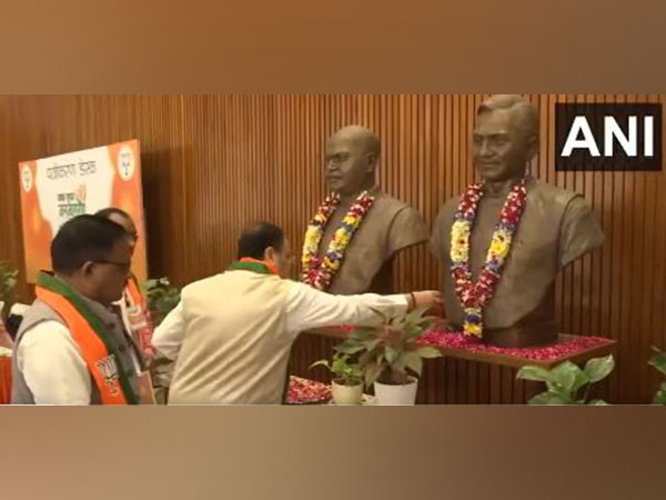 BJP President JP Nadda pays floral tributes to BJS founders at BJP headquarters in New Delhi . (Photo/ ANI)
