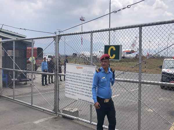 Scenes from the airport before the arrival of absconding royalist leader (Image/ANI)