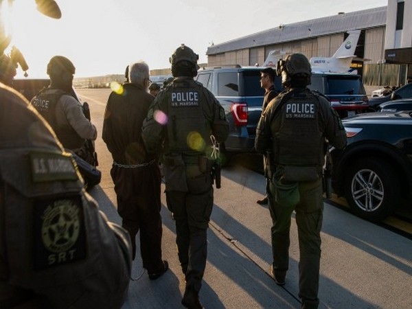 US Marshals in Central District of California transferring custody of Tahawwur Rana to representatives from MEA. (Photo credit/ US DoJ)