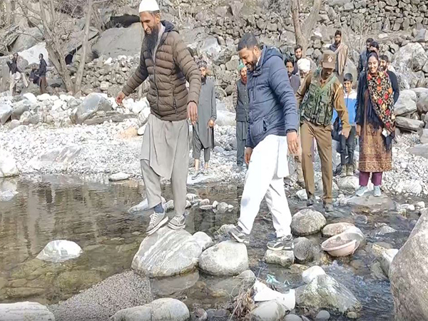 Bunjwah locals crossing the river. (Photo/ ANI) 