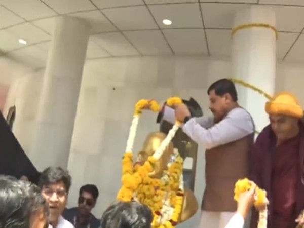 MP CM Mohan Yadav paying floral tribute to Dr BR Ambedkar(Photo/ANI)