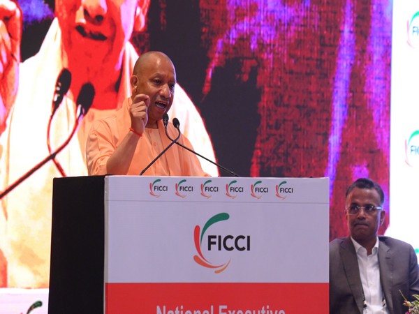 Uttar Pradesh Chief Minister Yogi Adityanath addressing FICCI National Executive Committee Meeting (Image: ANI)