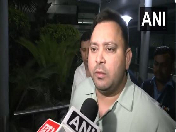 RJD leader Tejashwi Yadav arrives at the Delhi airport (Photo/ANI)