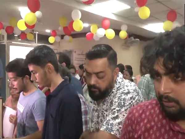 People line up in queue at a bank branch in Jammu for Amarnath yatra registration (Photo/ANI) 