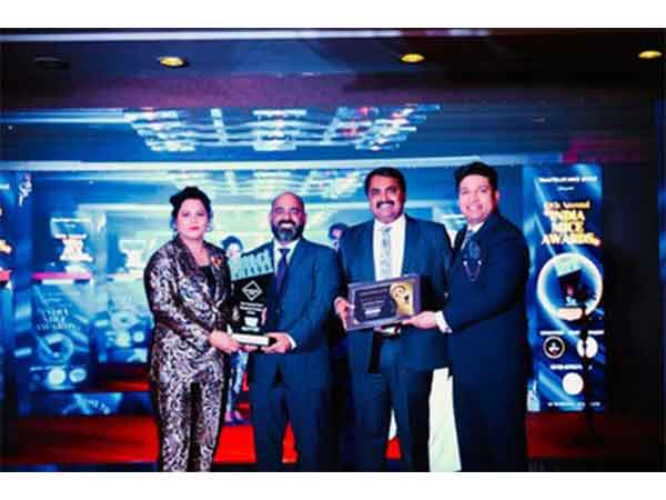 Unimoni's Director & CEO CA Krishnan R and John George, Vice President & National Business Head–Travel & Holidays, received the MICE Award