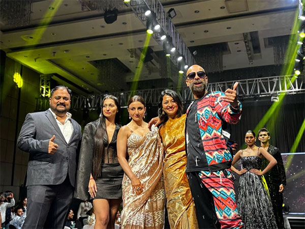Soha Ali Khan walking the ramp with Tejas Bahirat Patil Founder of TAB Group and Kashiff Khan of Fashion TV