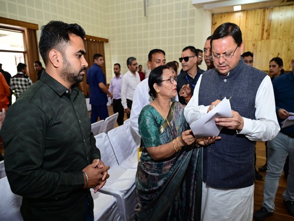 Uttarakhand CM Pushkar Singh Dhami hears the problems of people at Mukhya Sevak Sadan. (Photo/ANI)