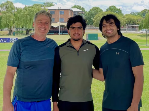 Himanshu Jakhar (centre) with Neeraj Chopra (right). (Photo: Olympics.com/Neeraj Chopra)