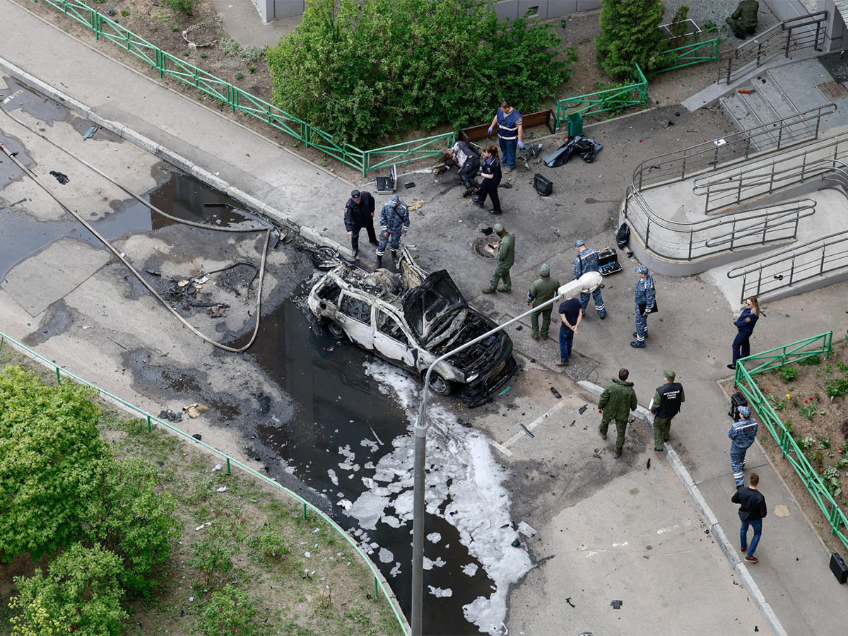 Law enforcement officers work at the site of a car explosion, which killed senior Russian military officer in Balashikha (Image Credit: Reuters)