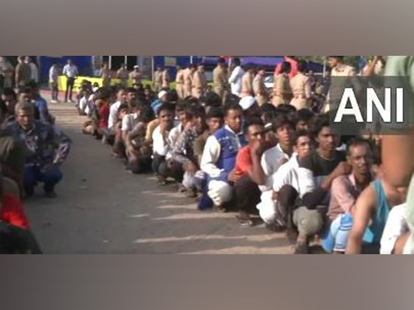 Security officials detain illegal immigrants during a statewide operation in Gujarat (Photo/ANI)