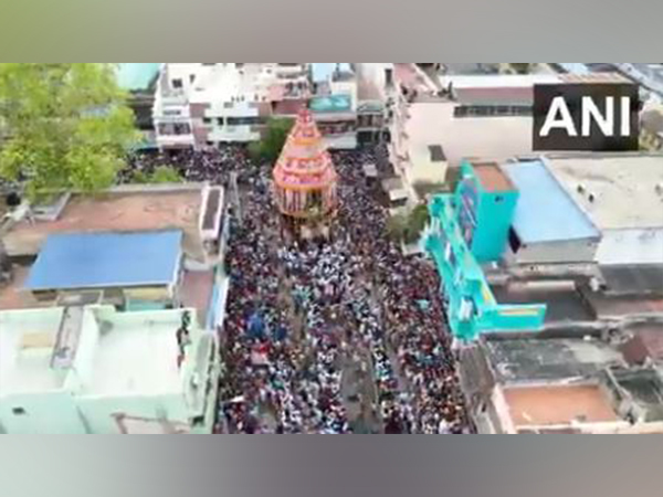 Devotees gathered to celebrate 'Chithirai Car' festival at Srirangam Temple (Photo/ANI)