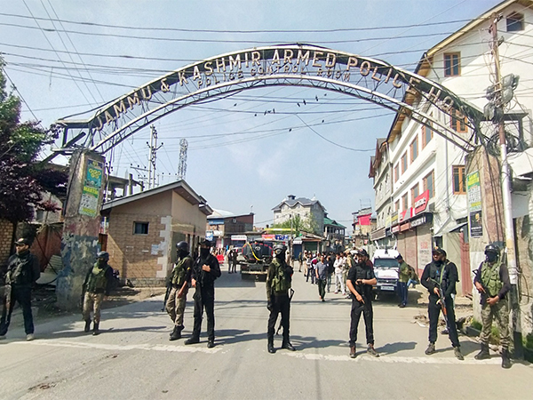 National Security Guard (NSG) and Paramilitary personnel stand guard outside Jammu and Kashmir Armed Police Headquarter - Police Control Room (Photo/ANI))