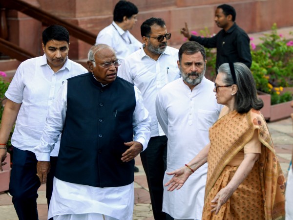 Congress President Mallikarjun Kharge with Party leaders Rahul Gandhi and Sonia Gandhi. (File Photo/ANI)