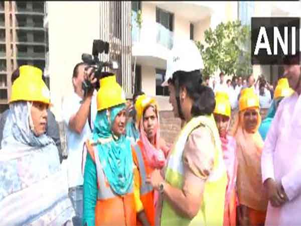 Delhi CM Rekha Gupta interacts with women workers on Labour Day (Photo/ANI) 