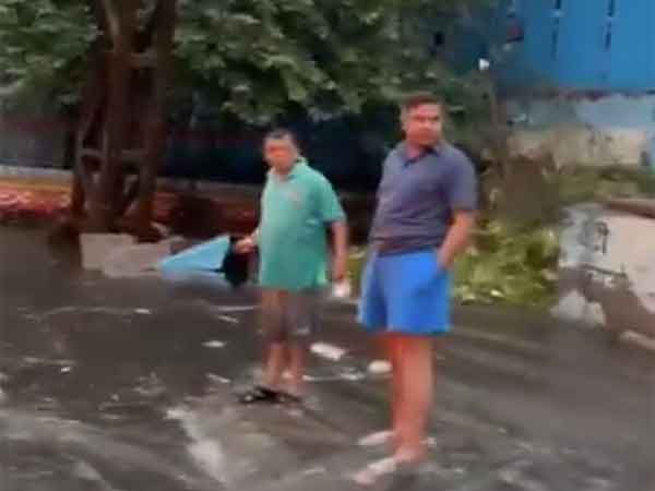 Delhi Minister Parvesh Verma examining the waterlooged areas. (Photo/ANI)