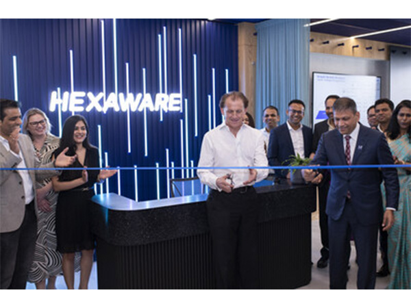 Celebrating New Beginnings - Sir Nigel Wilson and R. Srikrishna mark the occasion with a ceremonial cake, joined by Hexaware leaders and guests for the ribbon-cutting at the new headquarters