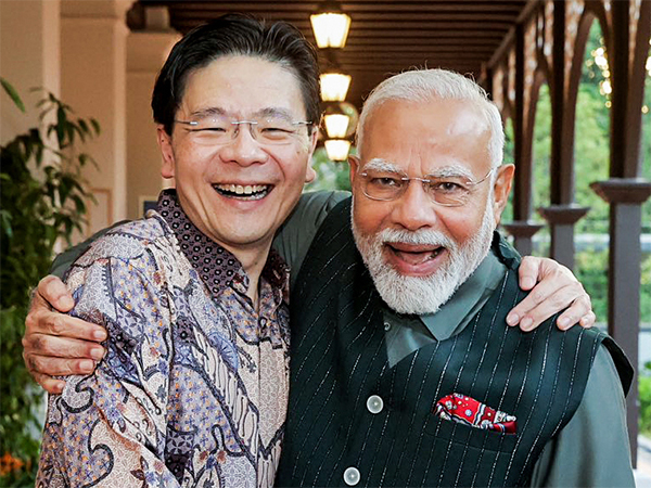 Prime Minister Narendra Modi and Singapore PM Lawrence Wong (File photo/ANI)