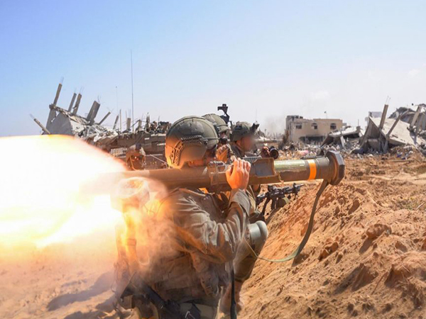 
    Israeli forces find Hamas weapons near former school
    