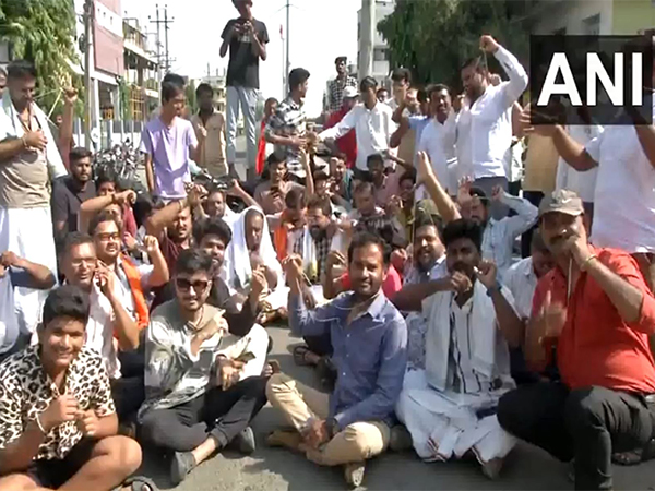 Protestors outside the St. Mary’s School exam centre (Photo/ANI)