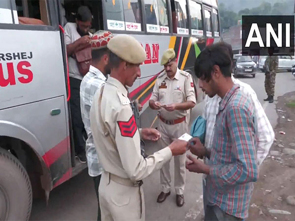 Visuals of security forces checking ID of people (Photo/ANI)