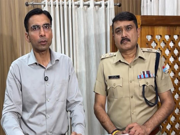  District Magistrate Savin Basnal and Senior Superintendent of Police Ajay Singh (Photo/ANI)