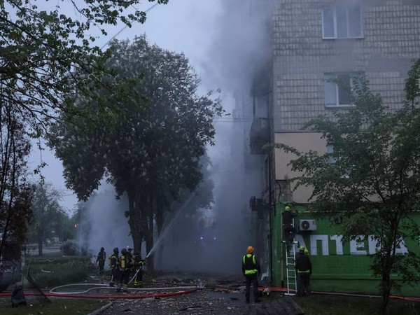 Firefighters work at the site an apartment building hit by a Russian drone strike, amid Russia's attack on Ukraine, in Kyiv (File image/Reuters)